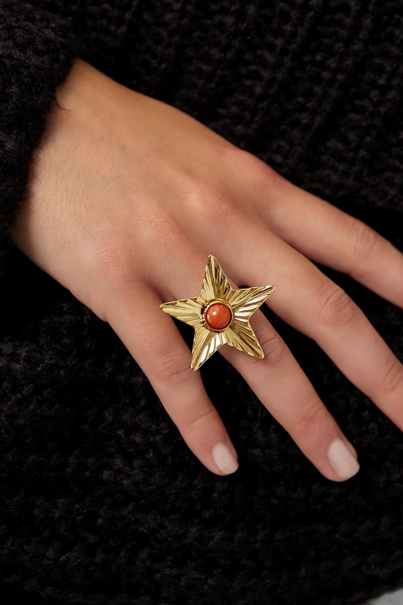 Star with colored stone ring